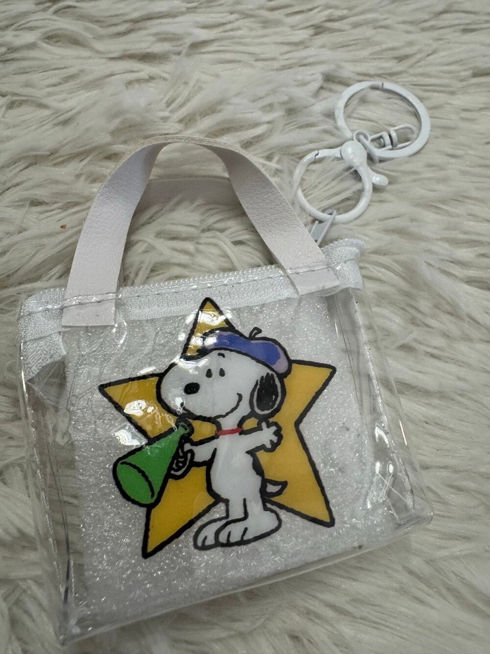Snoopy clear mini purse keychain Snoopy holding a green megaphone inside a star